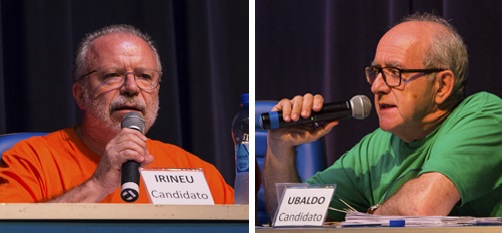 Montagem com os dois candidatos discursando em debate com microfone na mão; Irineu à esquerda, usando camiseta laranja; Ubaldo, à direita, usando camiseta verde