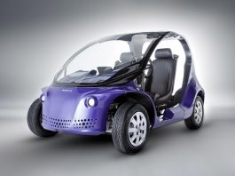 foto do carro elétrico de dois lugares visto de perspectiva cavaleira