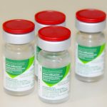 quatro doses de vacina
