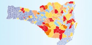 mapa de sc mostrando os municípios com mais quantidade de casa sem luz em escala de cores vermelhhas