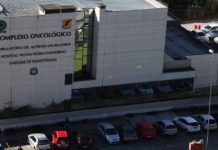 fachada do prédio do cepon vista do alto; carros estacionados na frente