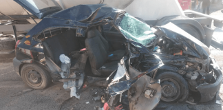 Operação Viagem Segura: Automóvel preto amassado em acidente de rodovia estadual em SC
