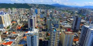 foto aérea dos bairros kobrasol e campinas, com muitos prédios - são josé lança novo código de obras