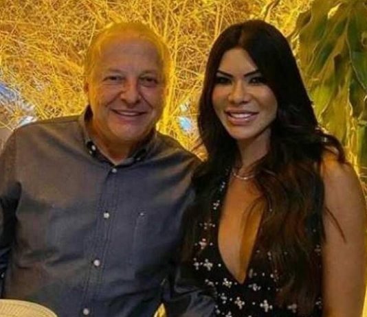 vice governador Otaviano Pivetta e aesposa viviana olham sorridentes para foto - ele é acusado de agredi-la em itapema
