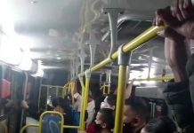 passageiros com máscaras aglomerados em pé em ônibus da jotur - procon pede perda da concessão