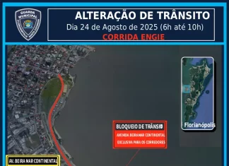 Imagem mostra um mapa da região continental de Florianópolis. A Avenida Beira-mar Continental aparece destacada em vermelho, indicando todo o percurso reservado para os atletas durante a Corrida Engie. A linha vermelha percorre a extensão da via, próxima ao mar, evidenciando o trajeto na área central do continente. O mapa também mostra ruas próximas, bairros vizinhos e pontos de referência urbanos.