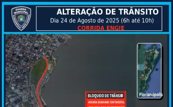 Imagem mostra um mapa da região continental de Florianópolis. A Avenida Beira-mar Continental aparece destacada em vermelho, indicando todo o percurso reservado para os atletas durante a Corrida Engie. A linha vermelha percorre a extensão da via, próxima ao mar, evidenciando o trajeto na área central do continente. O mapa também mostra ruas próximas, bairros vizinhos e pontos de referência urbanos.