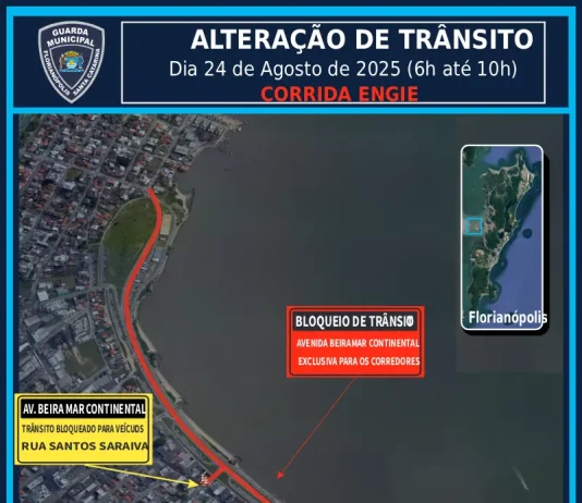 Imagem mostra um mapa da região continental de Florianópolis. A Avenida Beira-mar Continental aparece destacada em vermelho, indicando todo o percurso reservado para os atletas durante a Corrida Engie. A linha vermelha percorre a extensão da via, próxima ao mar, evidenciando o trajeto na área central do continente. O mapa também mostra ruas próximas, bairros vizinhos e pontos de referência urbanos.
