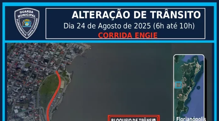 Imagem mostra um mapa da região continental de Florianópolis. A Avenida Beira-mar Continental aparece destacada em vermelho, indicando todo o percurso reservado para os atletas durante a Corrida Engie. A linha vermelha percorre a extensão da via, próxima ao mar, evidenciando o trajeto na área central do continente. O mapa também mostra ruas próximas, bairros vizinhos e pontos de referência urbanos.