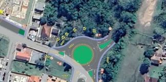 Vista aérea do local da futura rotatória em Forquilhas, com a área da obra destacada em verde, mostrando a implantação da nova estrutura viária.