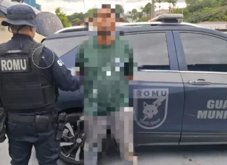 Agente da Guarda Municipal de São José durante prisão de foragido internacional