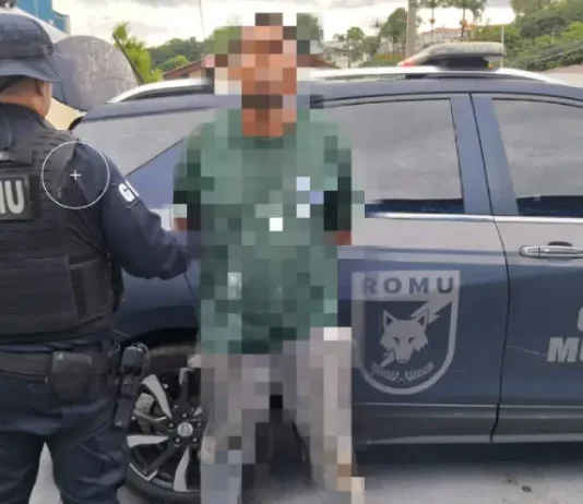 Agente da Guarda Municipal de São José durante prisão de foragido internacional