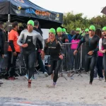 Atletas participando do IRONMAN Brasil