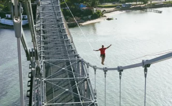 Ponte Hercílio Luz será palco de tentativa de recorde mundial de highline urbano Rafa Bridi praticando highline na Ponte Hercílio Luz
