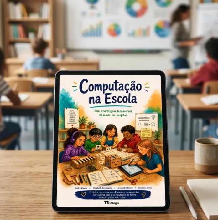 Tablet exibindo a capa do e-book “Computação na Escola”, material sobre ensino de computação na educação básica.