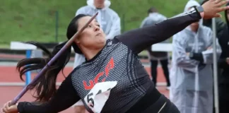 Atleta Daniella Mieko fazendo lançamento de dardo