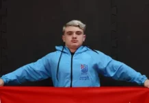 Arthur Kretzer, atleta de São José, posa com uniforme de judô em imagem que destaca o jovem campeão brasileiro de 12 anos.