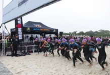 Ironman 70.3 reúne 1.800 atletas em Florianópolis e provoca mudanças no trânsito neste domingo Atletas participam da largada do IRONMAN 70.3 em Florianópolis, acompanhados pelo público na praia.